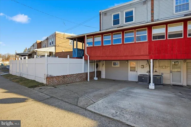 a front view of a building with street