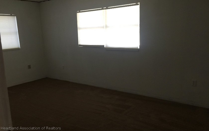 3905 Lakewood Road Sebring, FL 33875 - Photo 17 of 18 a view of a small space with a window