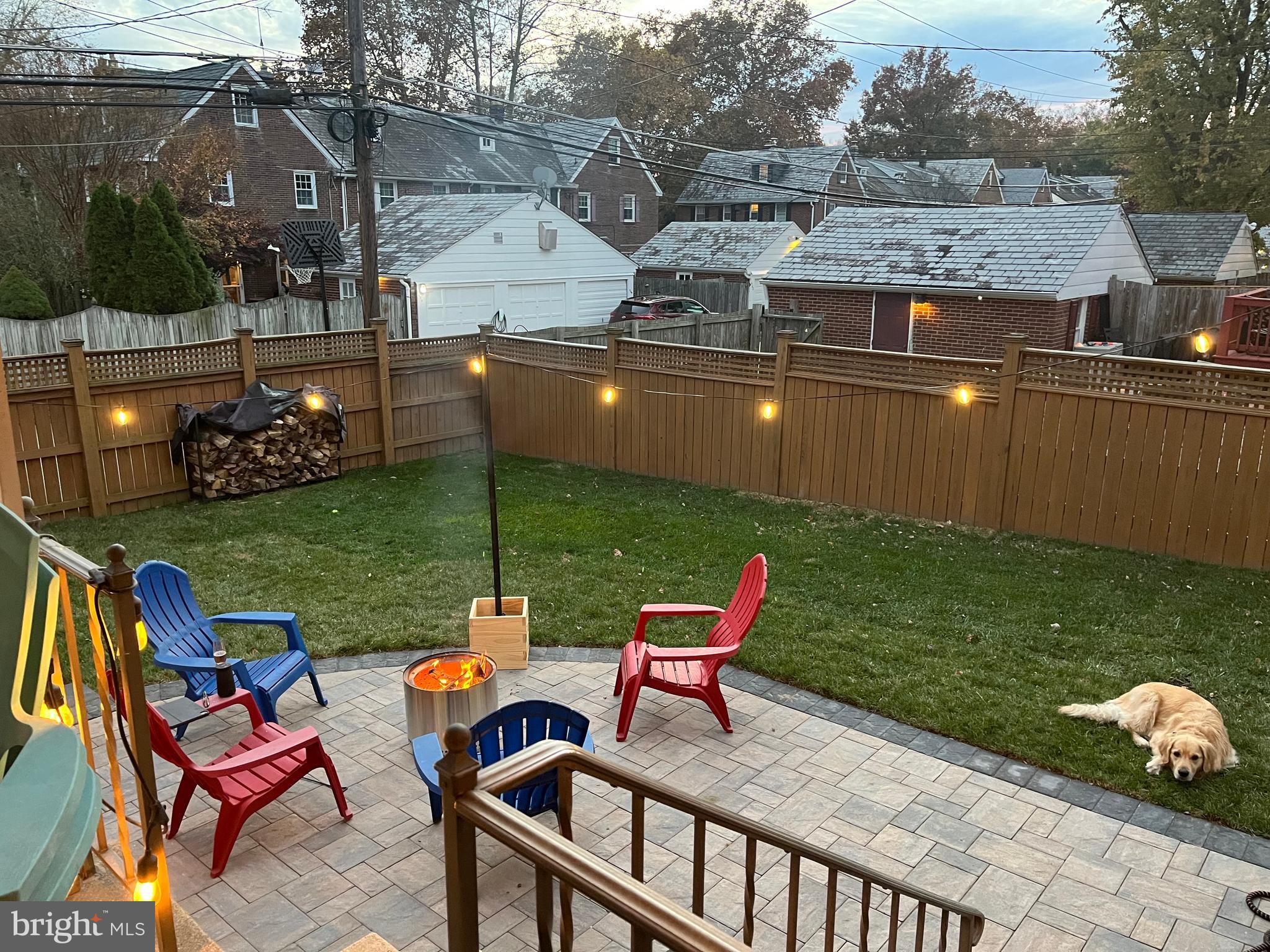409 Regester Avenue Baltimore, MD 21212 - Photo 40 of 44 a roof deck with table and chairs and potted plants