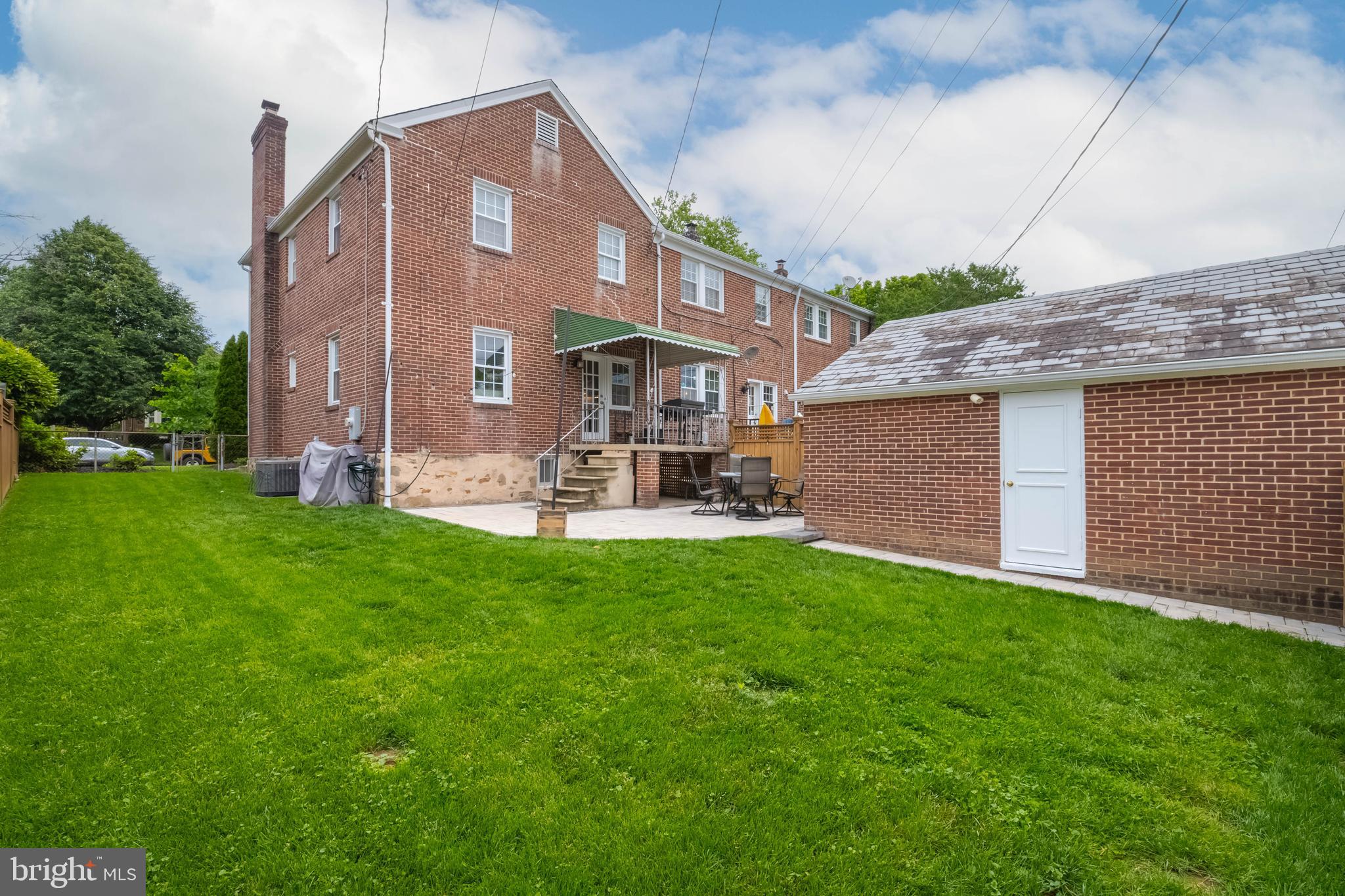 409 Regester Avenue Baltimore, MD 21212 - Photo 6 of 44 a front view of house with yard