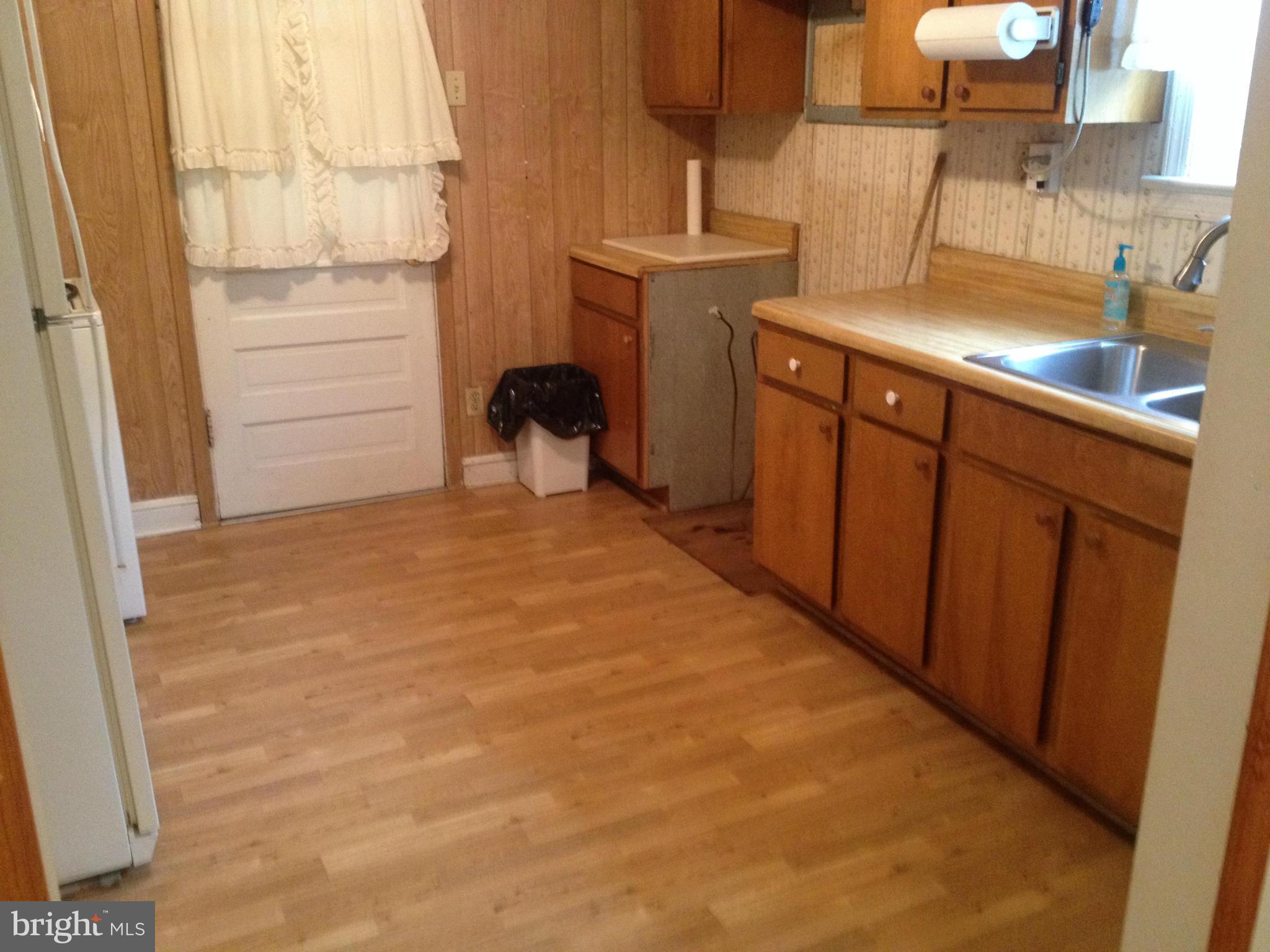25141 Old Hundred Road Dickerson, MD 20842 - Photo 4 of 15 a bathroom with a sink and a mirror