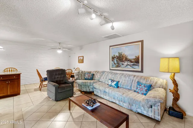 a living room with furniture and a couch