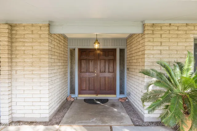 a front view of a house with a garage