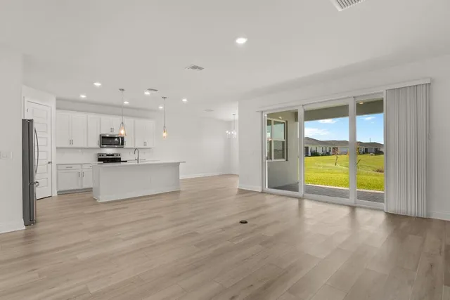 a view of kitchen with a sink and a kitchen view
