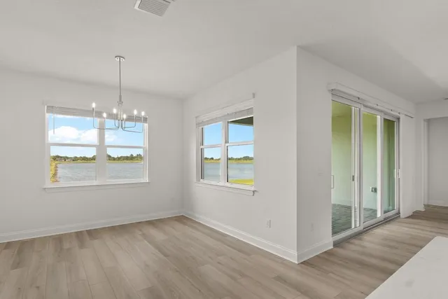 an empty room that has a window