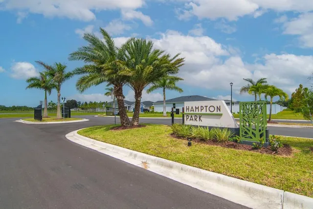 a sign board with a lake view