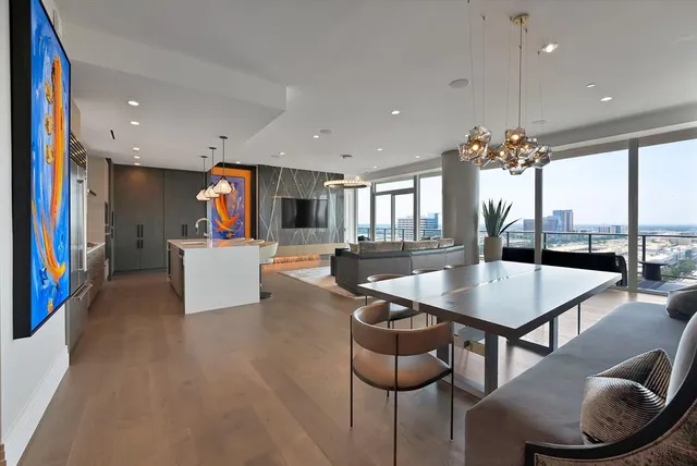 a living room with furniture and a table