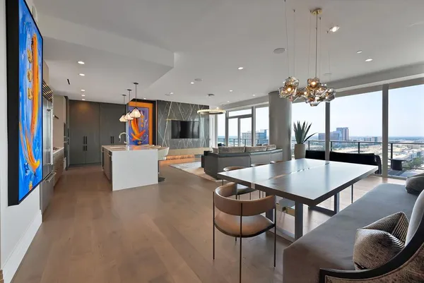 a living room with furniture and a table