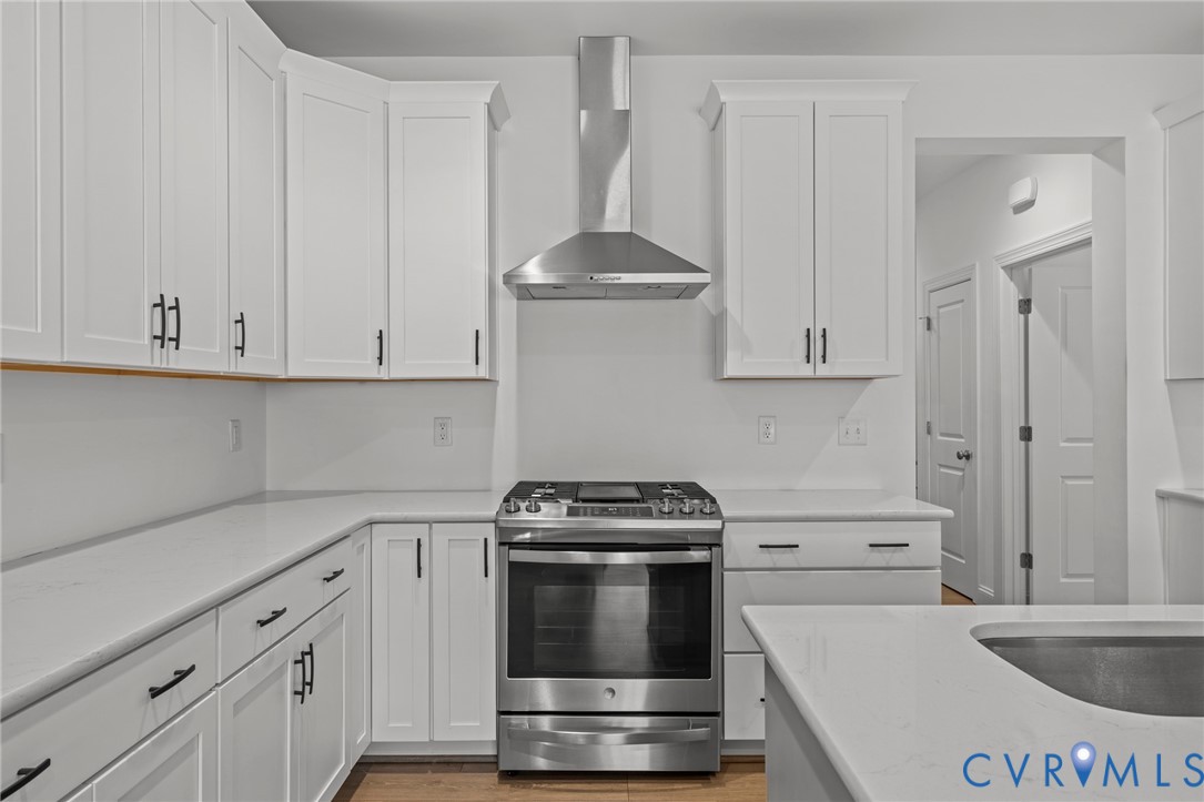 224 Lauradell Road Ashland, VA 23005 - Photo 16 of 74 Modern kitchen featuring white shaker cabinetry wi