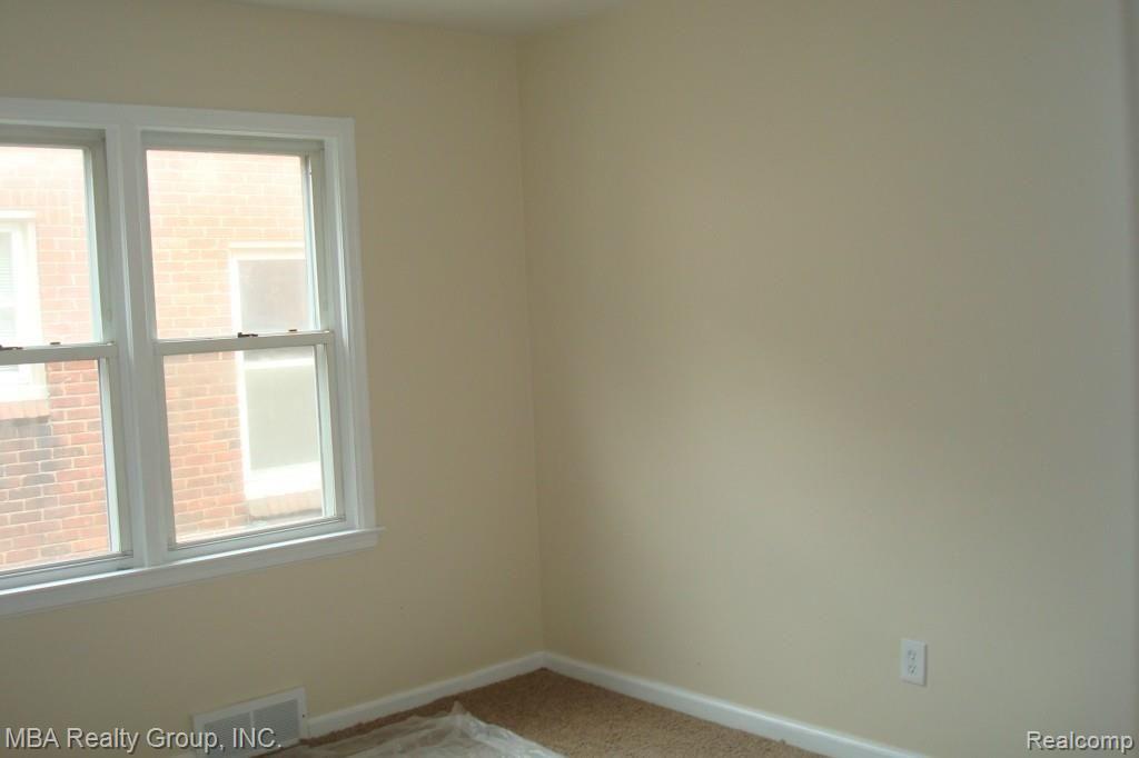 18479 Annchester Road Detroit, MI 48219 - Photo 12 of 14 MASTER BEDROOM NEW CARPET