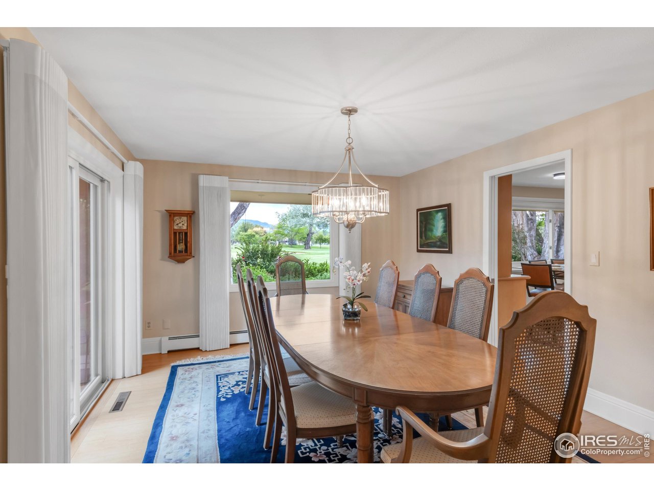 1409 Old Tale Road Boulder, CO 80303 - Photo 16 of 40 a view of a dining room with furniture window and outside view