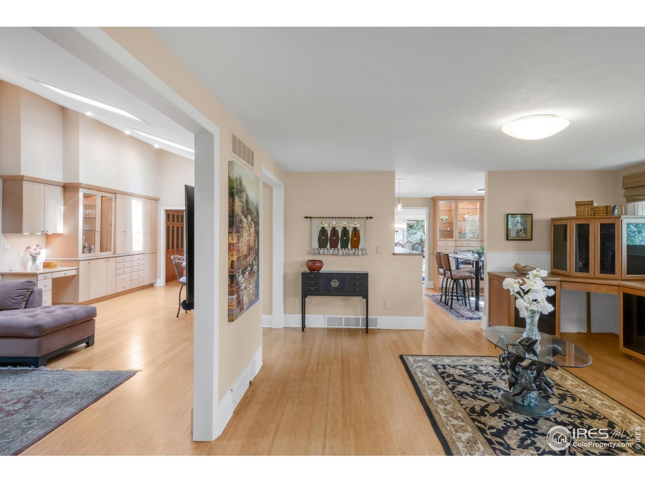 1409 Old Tale Road Boulder, CO 80303 - Photo 20 of 40 a living room with furniture and a wooden floor