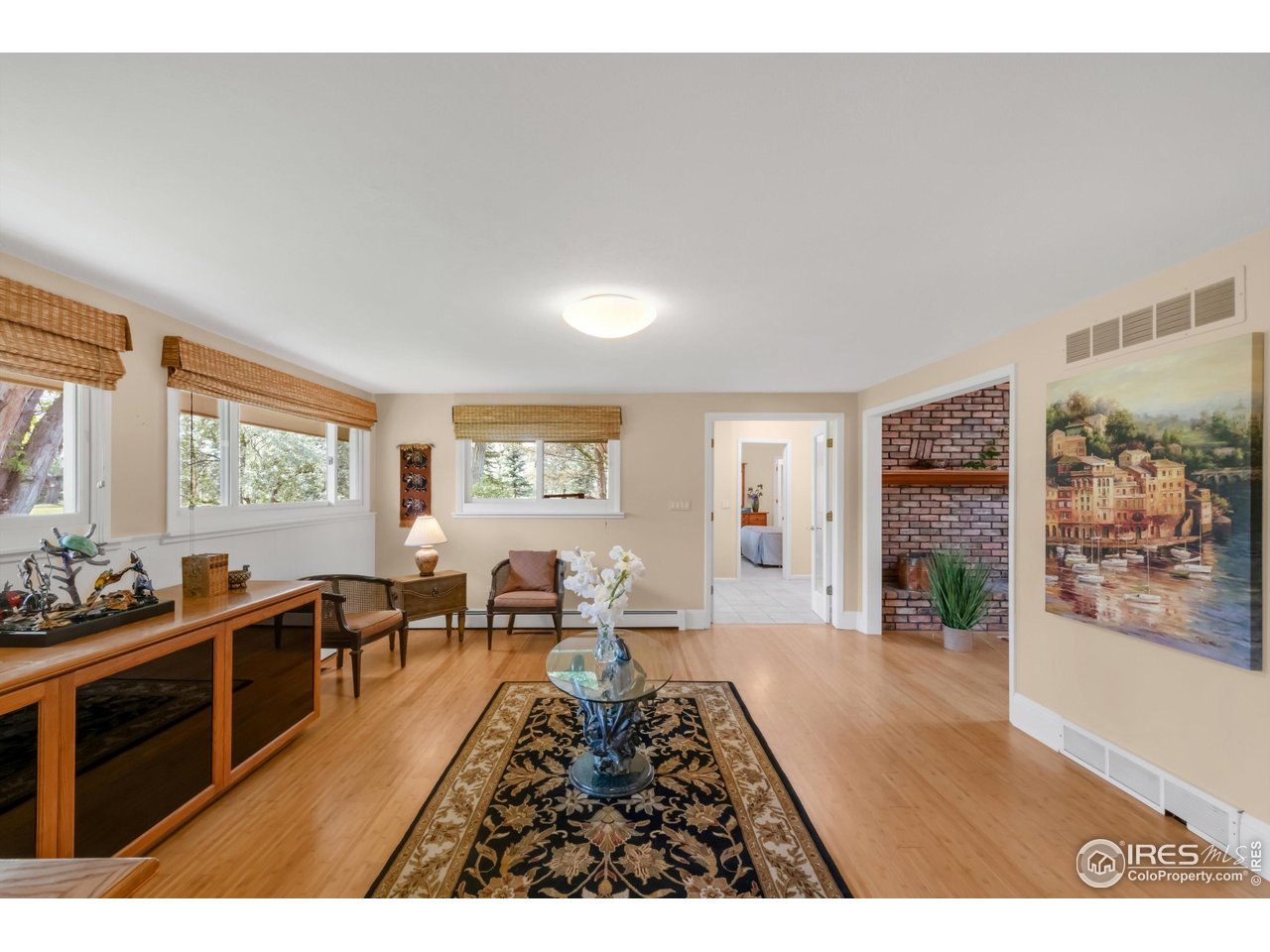 1409 Old Tale Road Boulder, CO 80303 - Photo 23 of 40 a living room with furniture and wooden floor