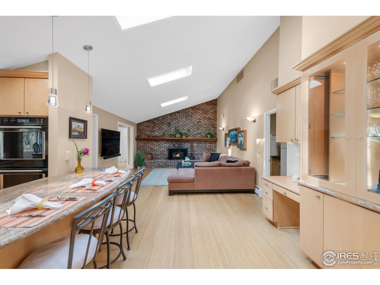 1409 Old Tale Road Boulder, CO 80303 - Photo 24 of 40 a living room with furniture and a table