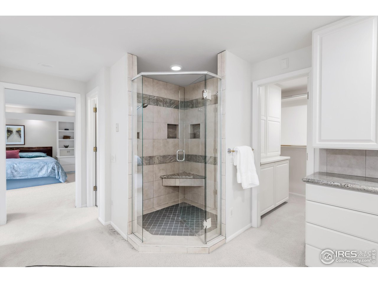 1409 Old Tale Road Boulder, CO 80303 - Photo 33 of 40 a bathroom with a sink and a mirror