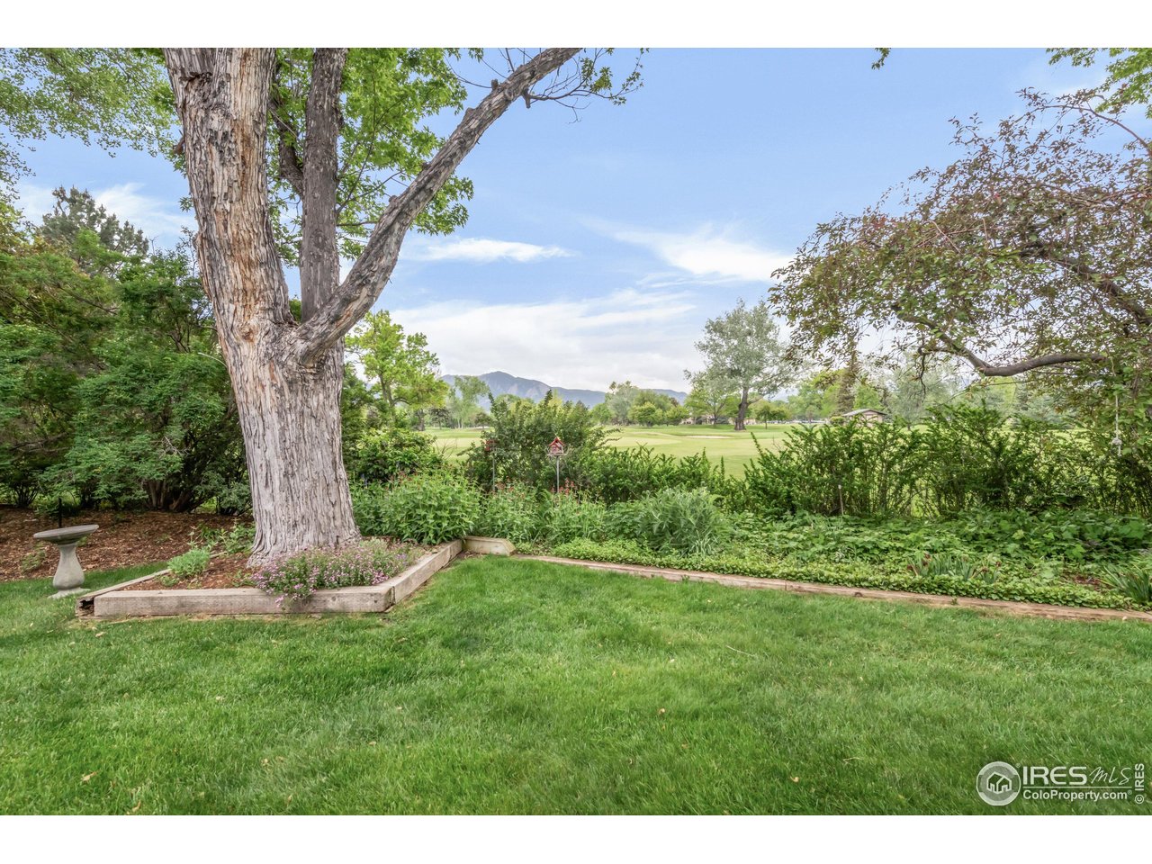 1409 Old Tale Road Boulder, CO 80303 - Photo 40 of 40 a view of outdoor space with deck and yard