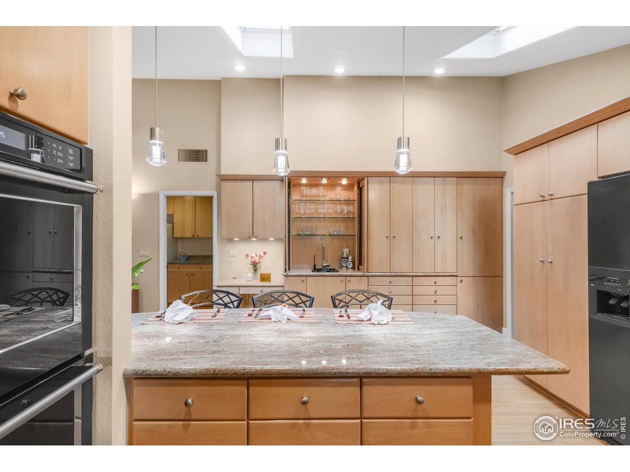 1409 Old Tale Road Boulder, CO 80303 - Photo 10 of 40 a bathroom with a granite countertop sink and a mirror