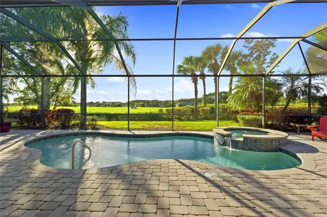 a view of a swimming pool with a patio