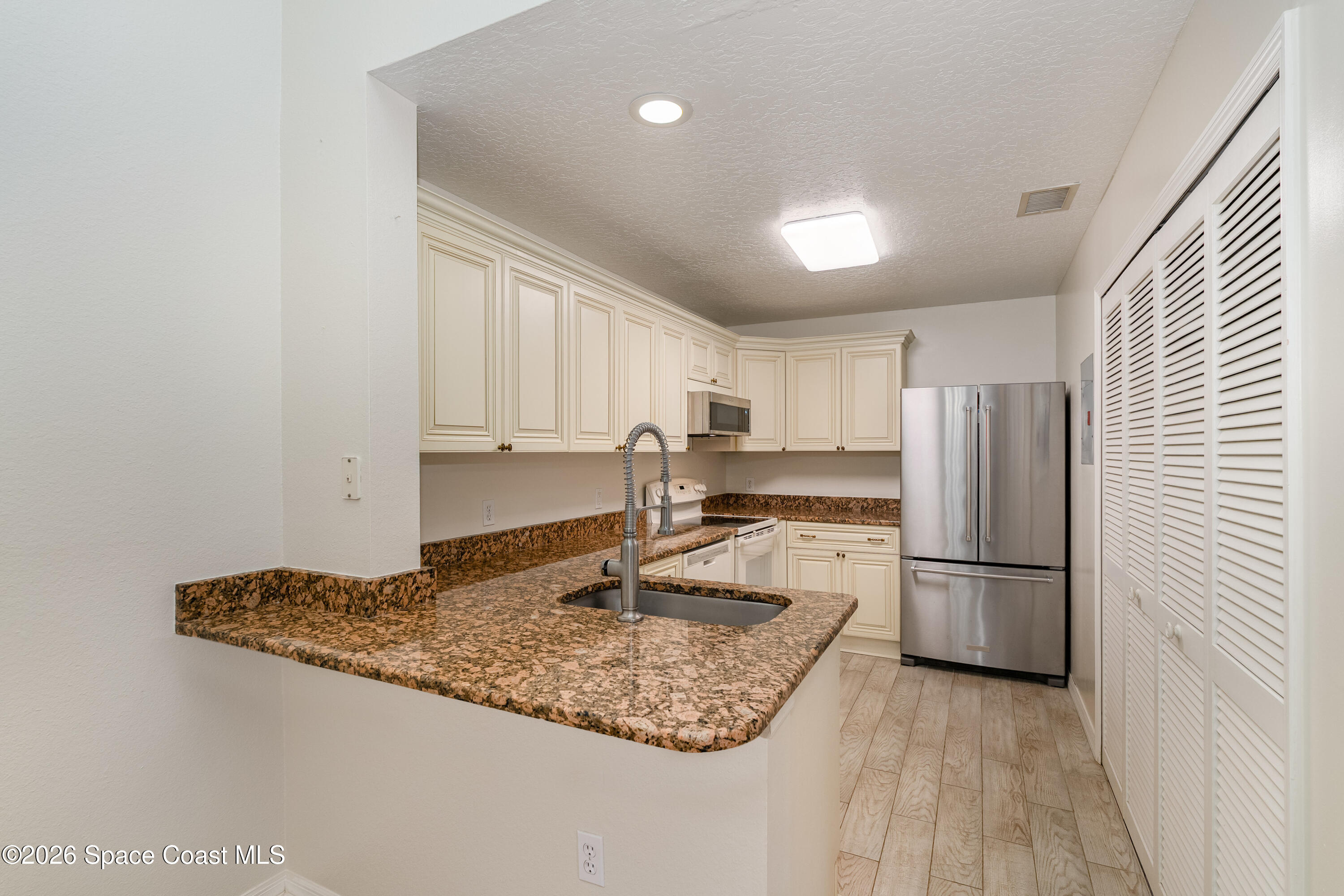 1933 Quail Ridge Court, Unit 1101 Cocoa, FL 32926 - Photo 12 of 33 010_dsc00173-edit_315