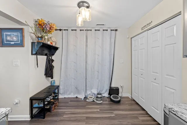 a bathroom with a sink mirror and vanity