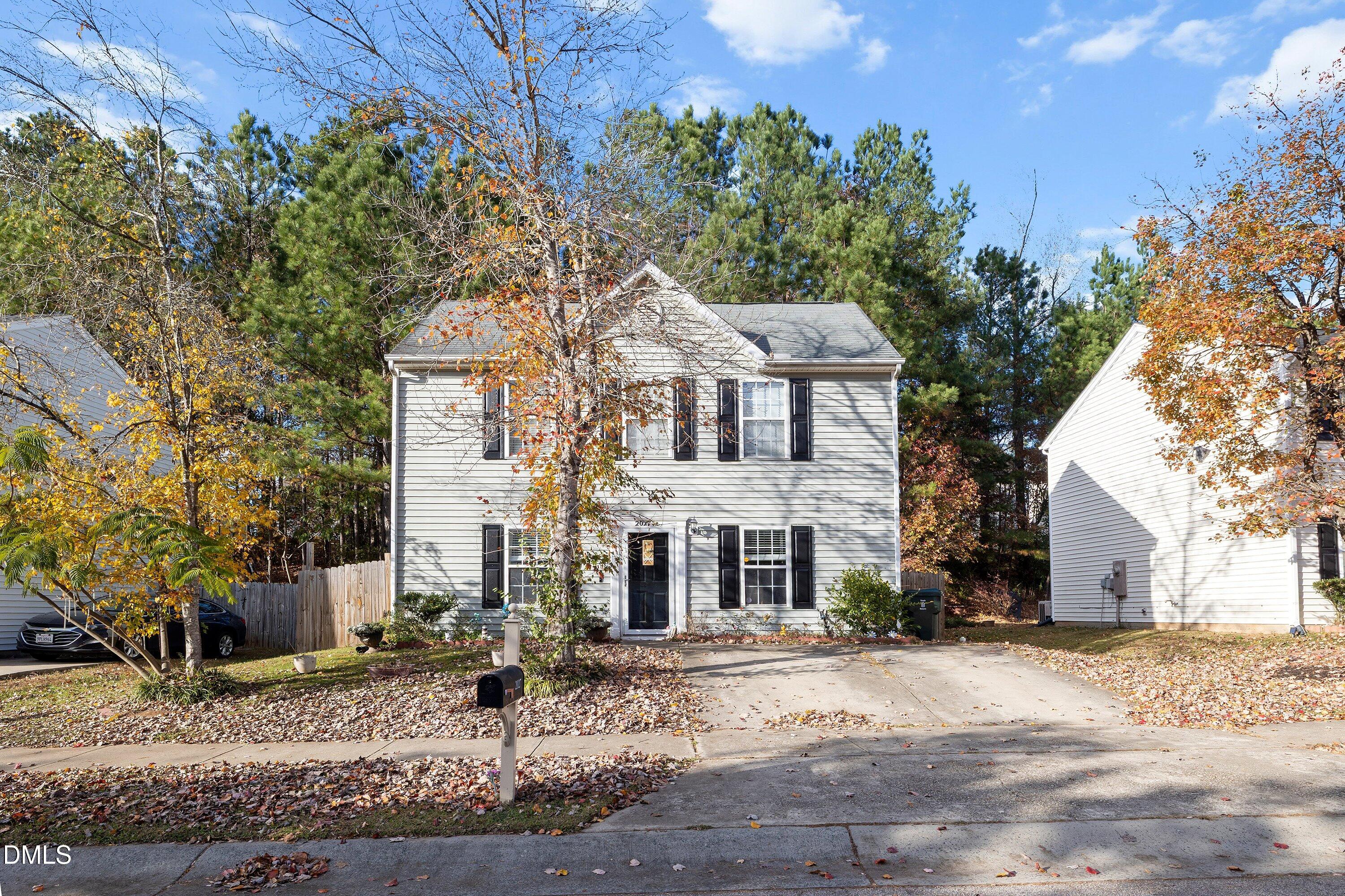 2027 Buffalo Way Durham, NC 27704 - Photo 2 of 30 a front view of a house with garden