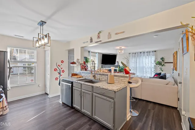 a view of living room with furniture and flat screen tv