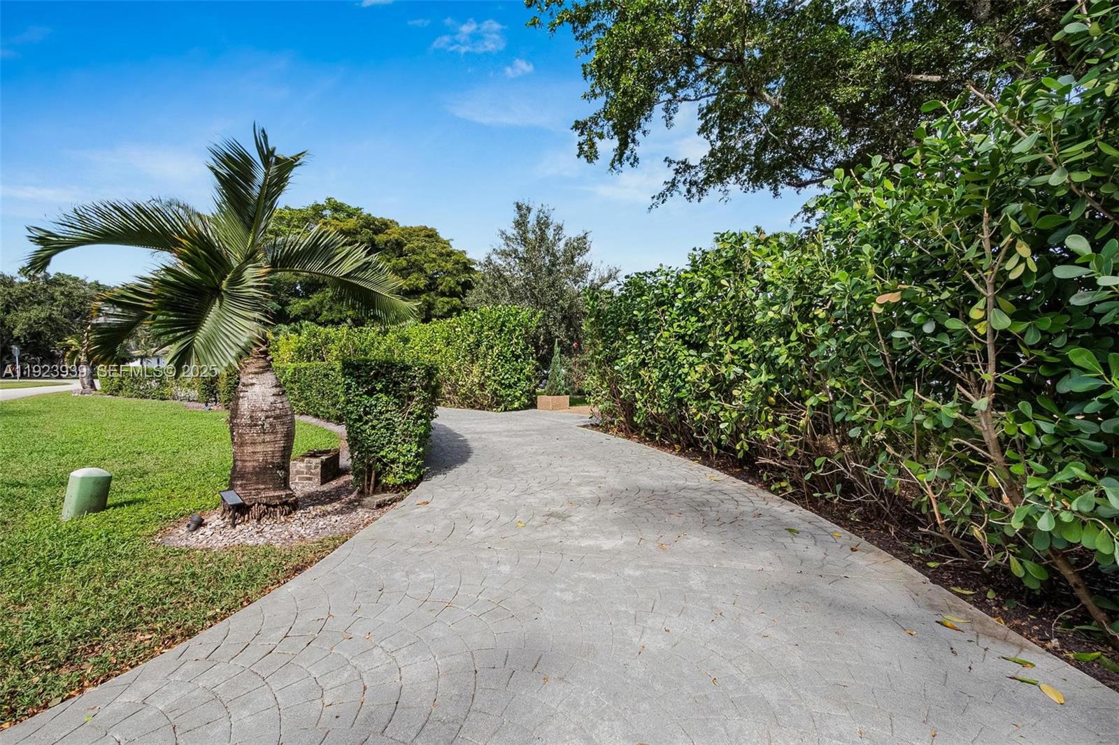 11155 Southwest 40th Street Davie, FL 33328 - Photo 33 of 74 a view of a backyard with a tree