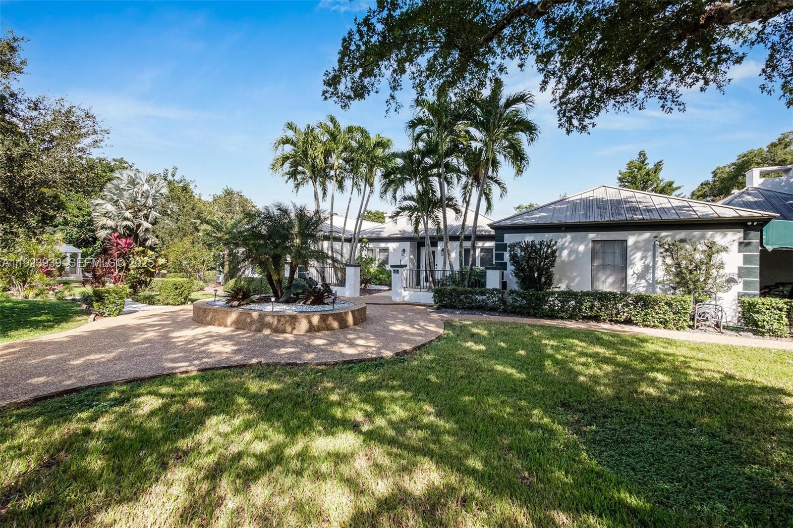 11155 Southwest 40th Street Davie, FL 33328 - Photo 34 of 74 a view of a house with a yard and sitting area