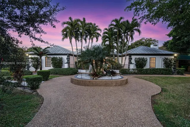 a view of a patio with swimming pool and porch