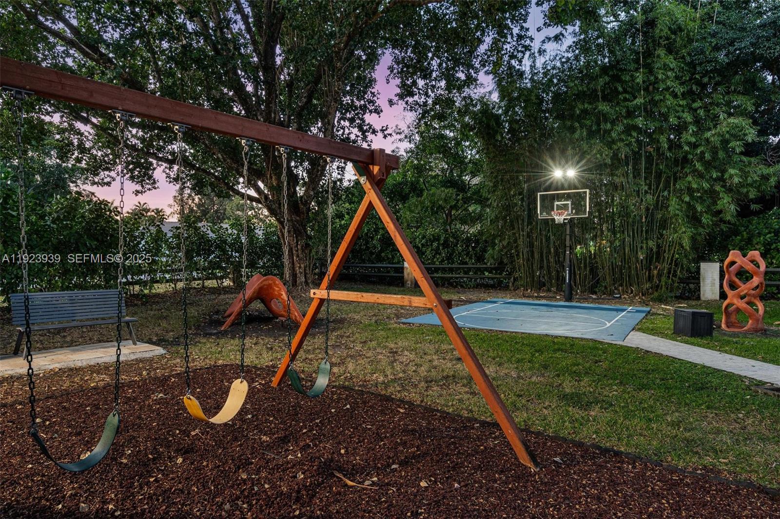 11155 Southwest 40th Street Davie, FL 33328 - Photo 39 of 74 a view of a backyard with swimming pool