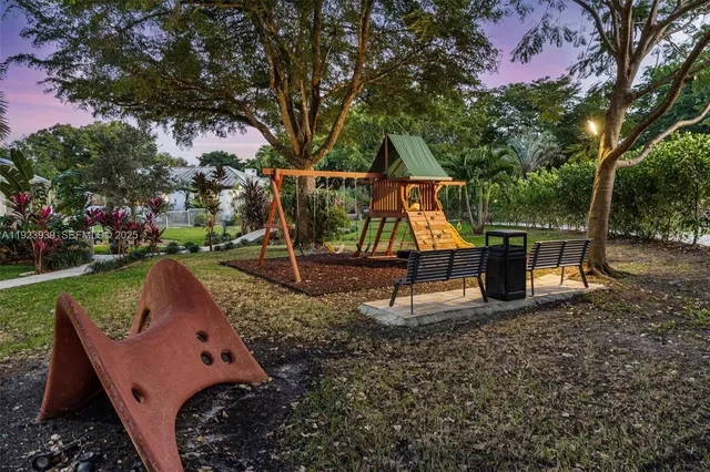 a view of yard with patio