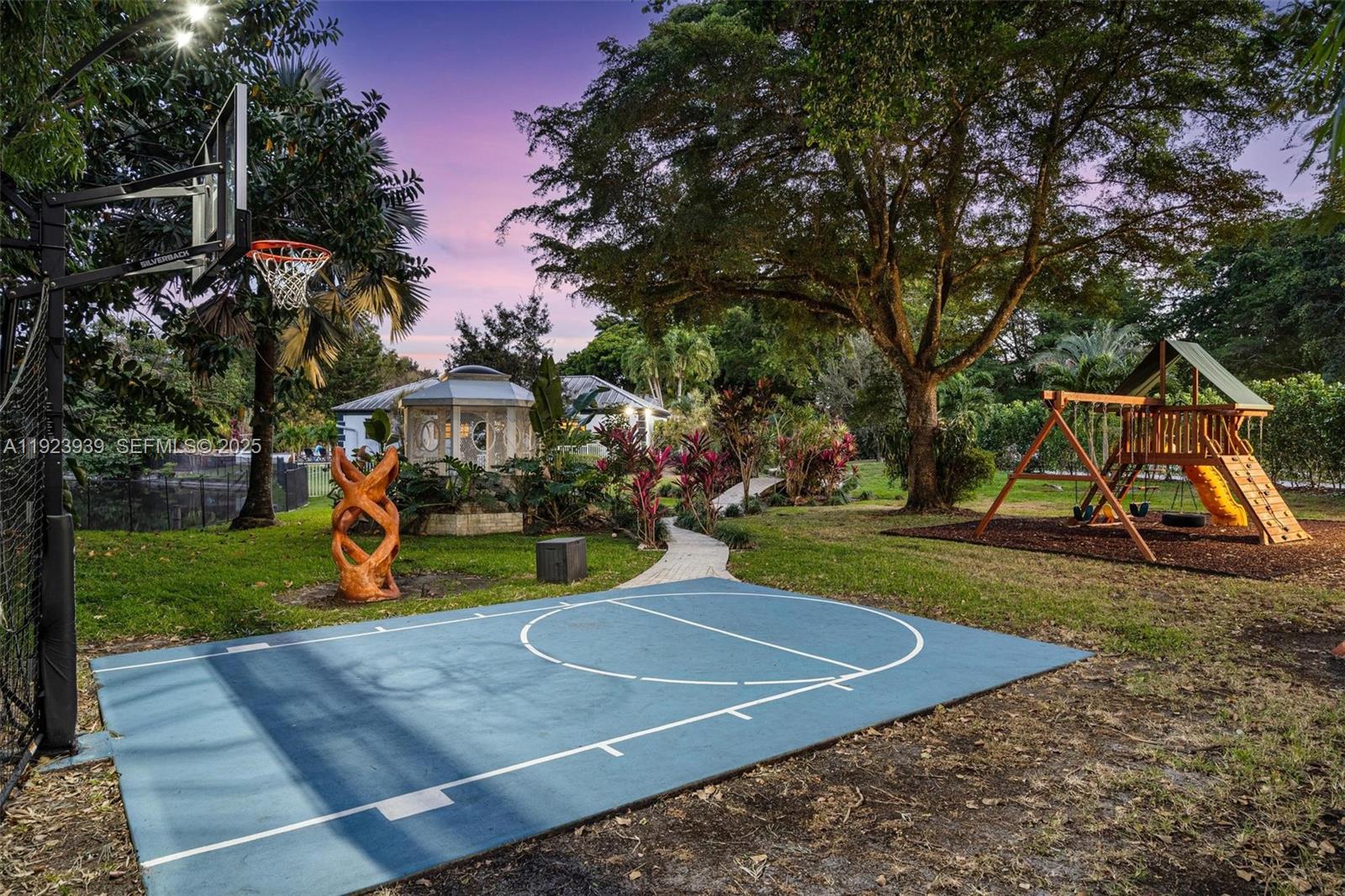 11155 Southwest 40th Street Davie, FL 33328 - Photo 42 of 74 a view of a park with slide