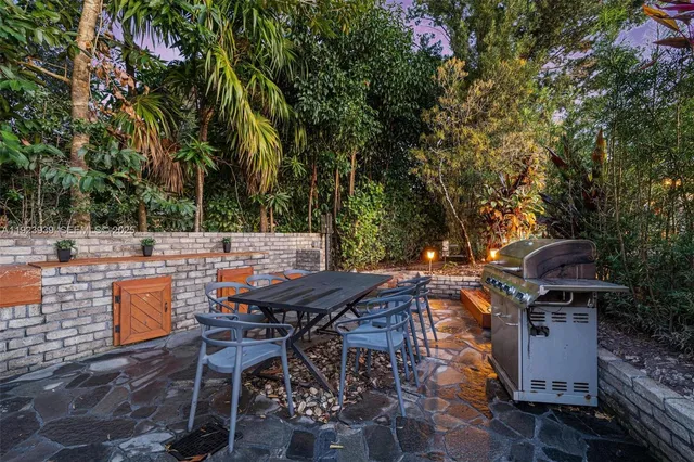 a view of a backyard with a small house