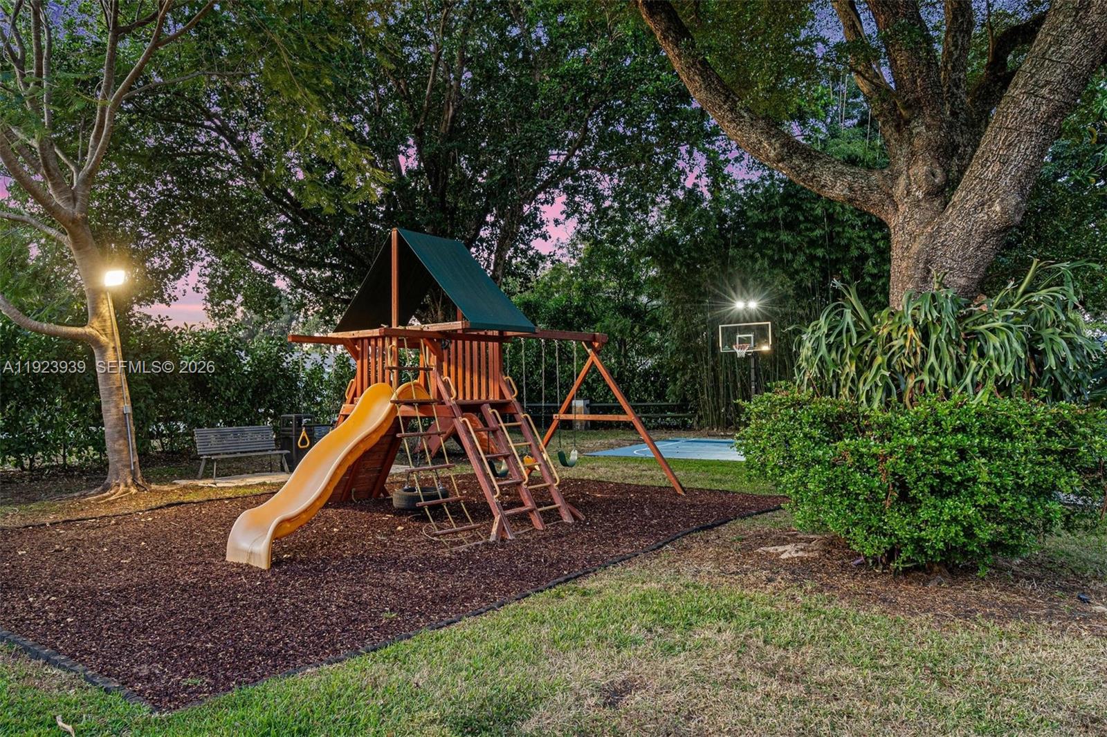 11155 Southwest 40th Street Davie, FL 33328 - Photo 64 of 100 a view of a park with a slide