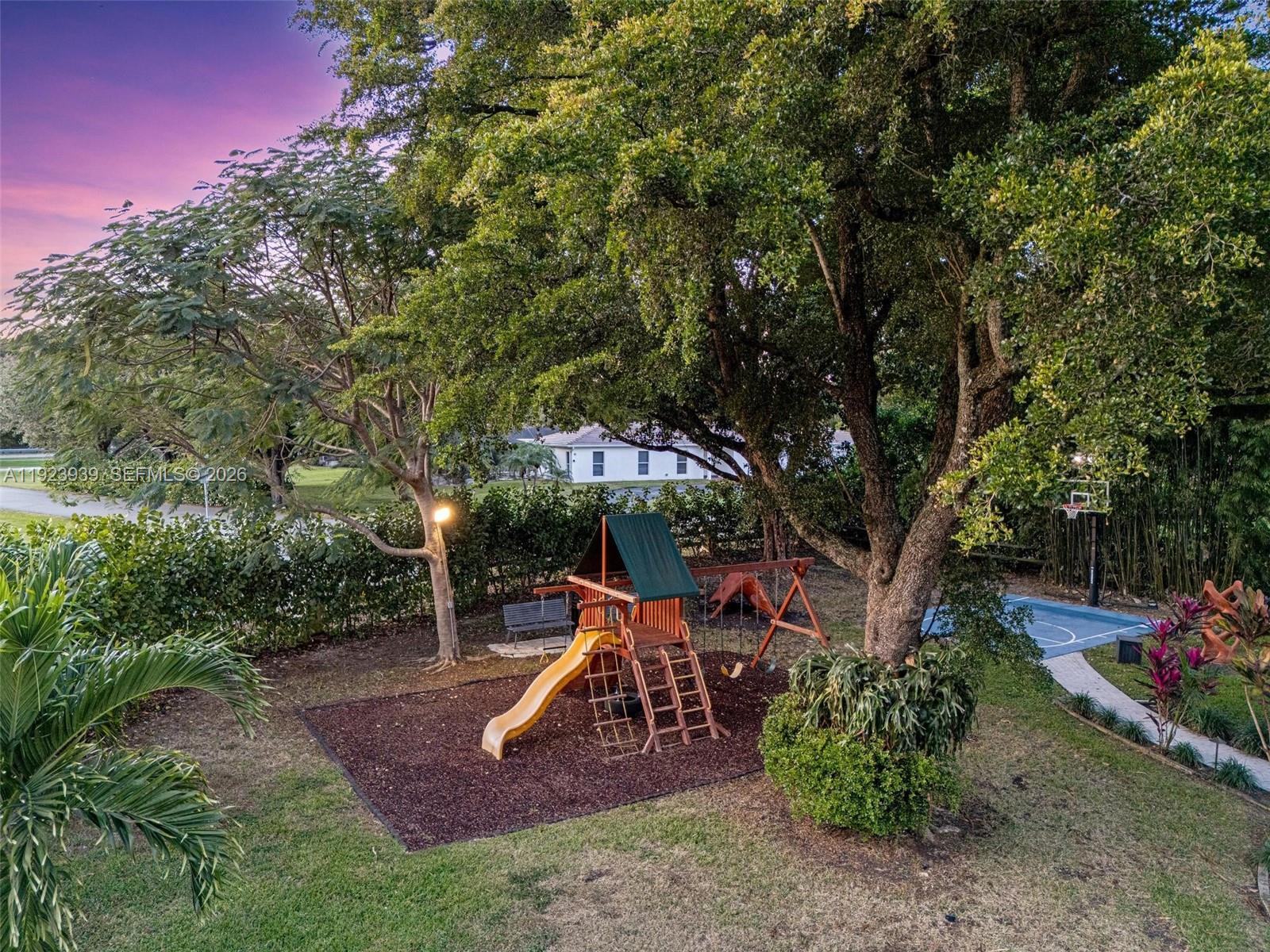 11155 Southwest 40th Street Davie, FL 33328 - Photo 96 of 100 a view of a park with slide