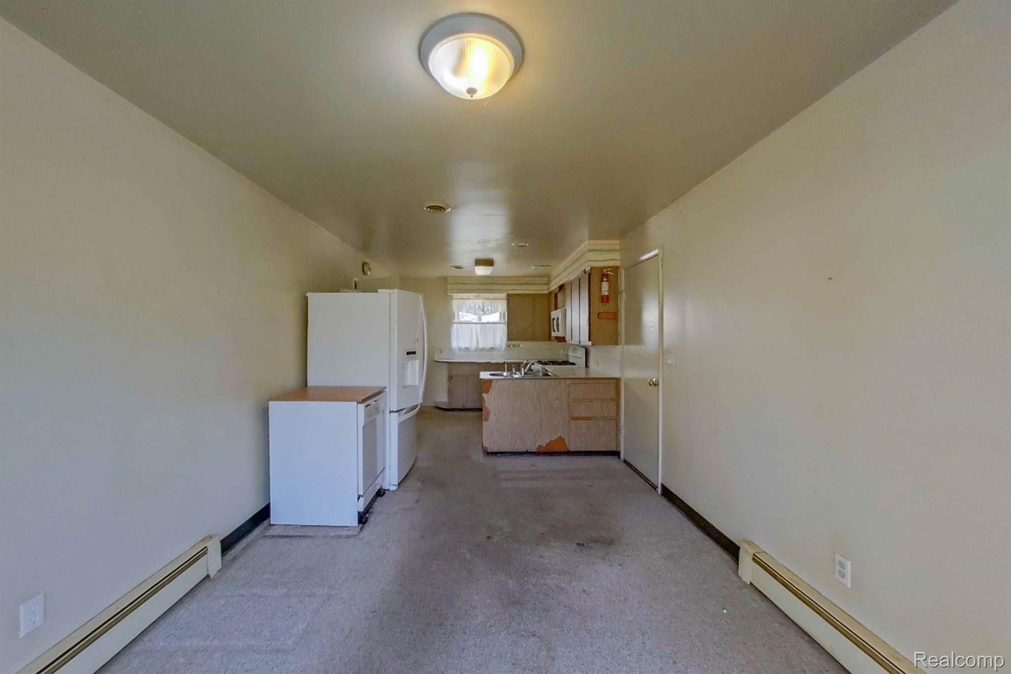 237 Elms Road Flushing, MI 48433 - Photo 13 of 69 Dining Room into Kitchen