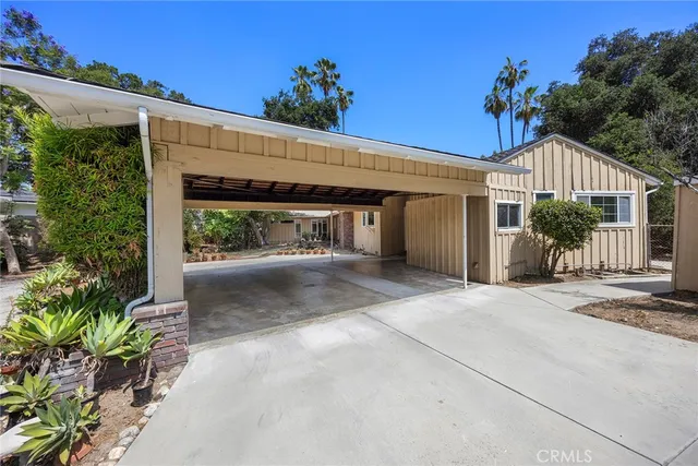 a view of a house with a garden