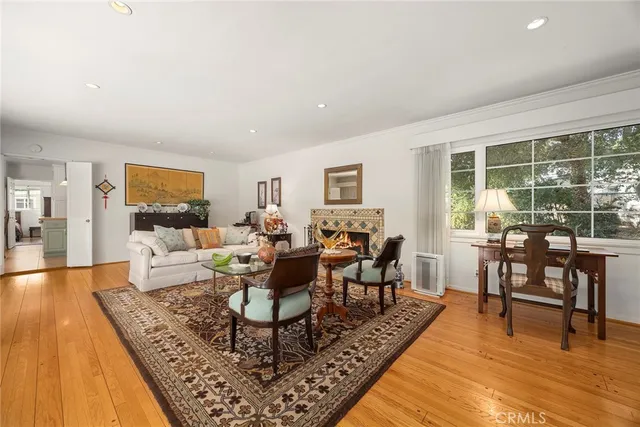 a living room with furniture and a table