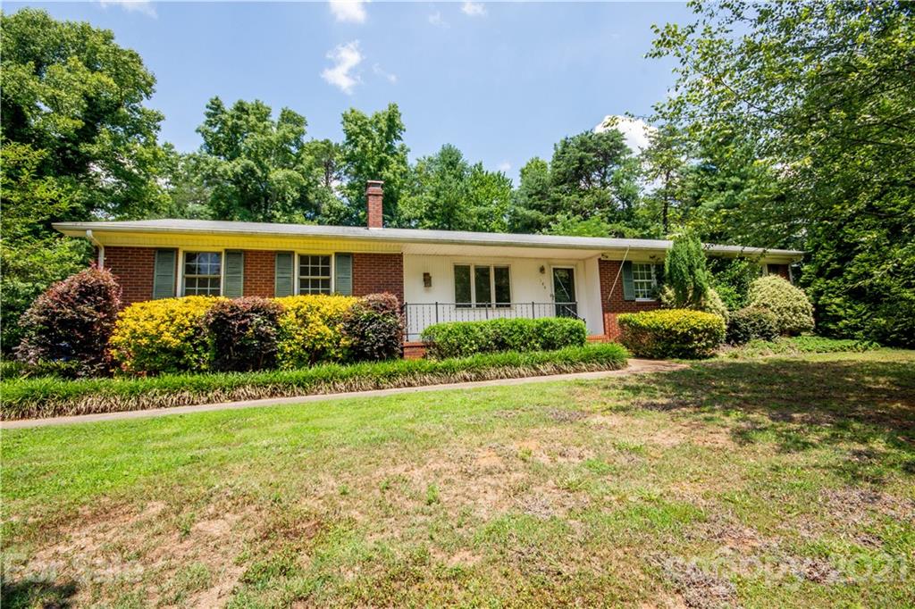 144 Buffaloway Road Statesville, NC 28677 - Photo 3 of 33 a house view with a garden space