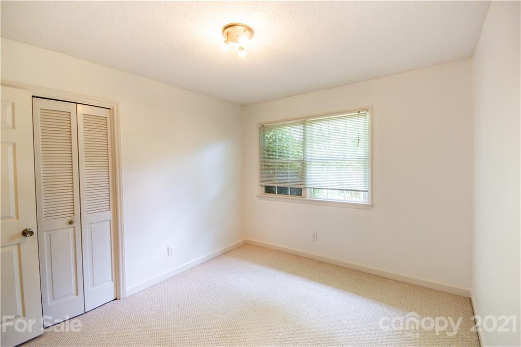 144 Buffaloway Road Statesville, NC 28677 - Photo 23 of 33 an empty room with a window