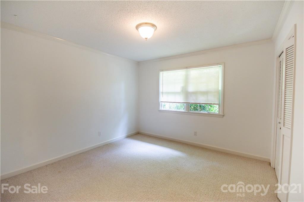 144 Buffaloway Road Statesville, NC 28677 - Photo 25 of 33 an empty room with windows