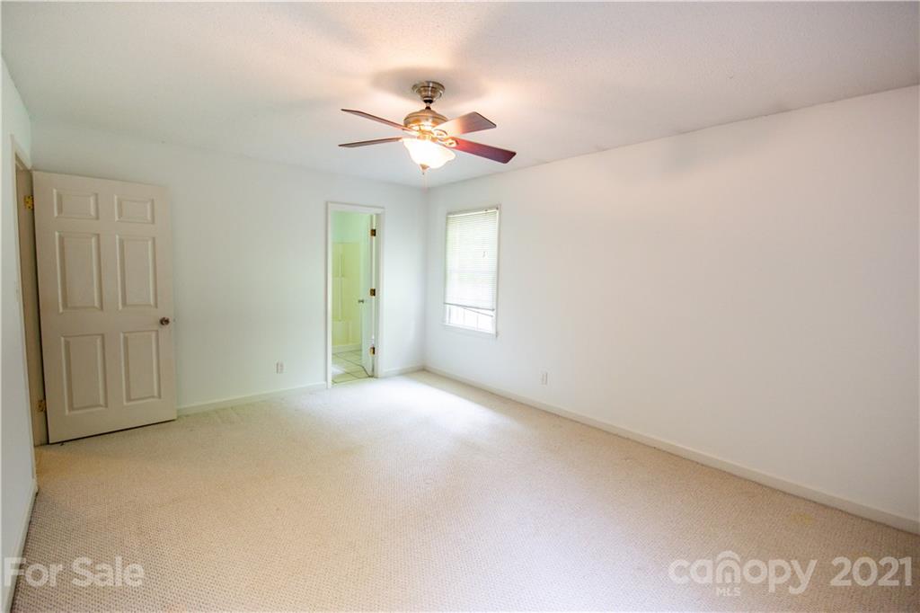 144 Buffaloway Road Statesville, NC 28677 - Photo 28 of 33 a view of an empty room with a window