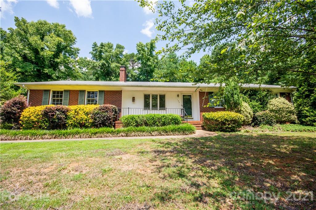 144 Buffaloway Road Statesville, NC 28677 - Photo 4 of 33 a house view with a garden space