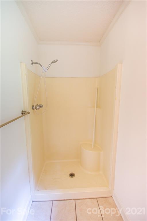 144 Buffaloway Road Statesville, NC 28677 - Photo 32 of 33 a bathroom with a shower
