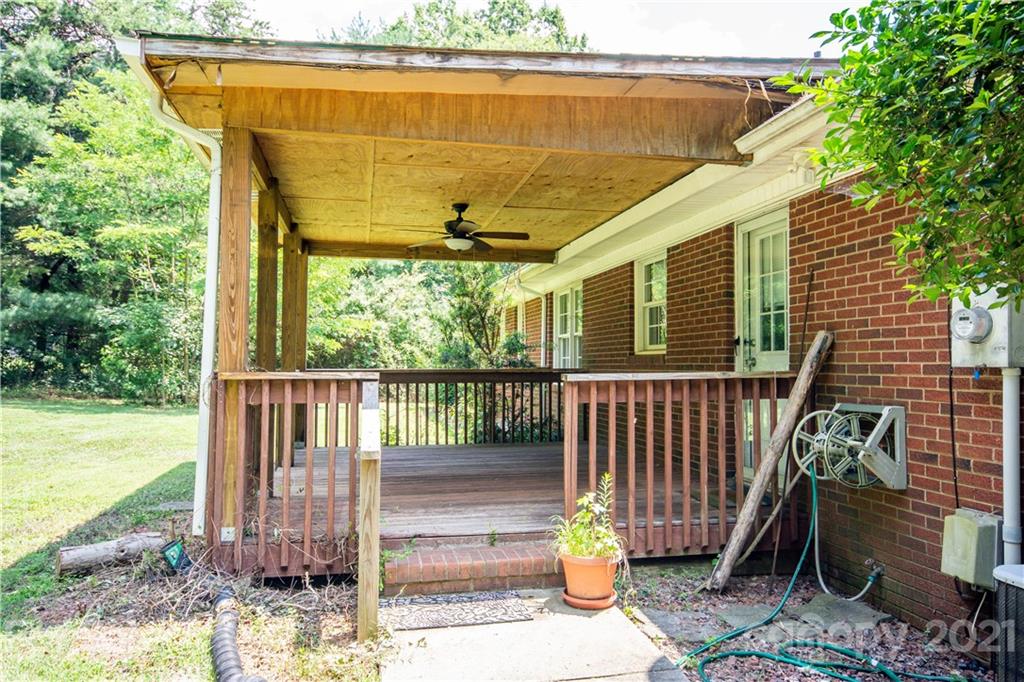 144 Buffaloway Road Statesville, NC 28677 - Photo 7 of 33 a front view of a house with a garden