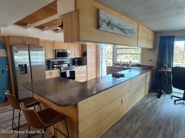 a view of a dining room with furniture