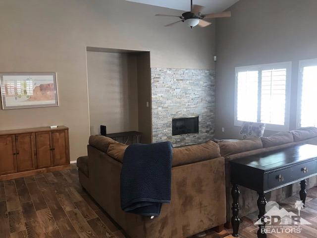78658 Ewarton Road Bermuda Dunes, CA 92203 - Photo 6 of 10 a living room with furniture and a fireplace