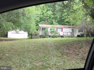 16670 Bennett Court Ridge, MD 20680 - Photo 6 of 15 16674 UNIT - Manuf home with garage. Needs work!