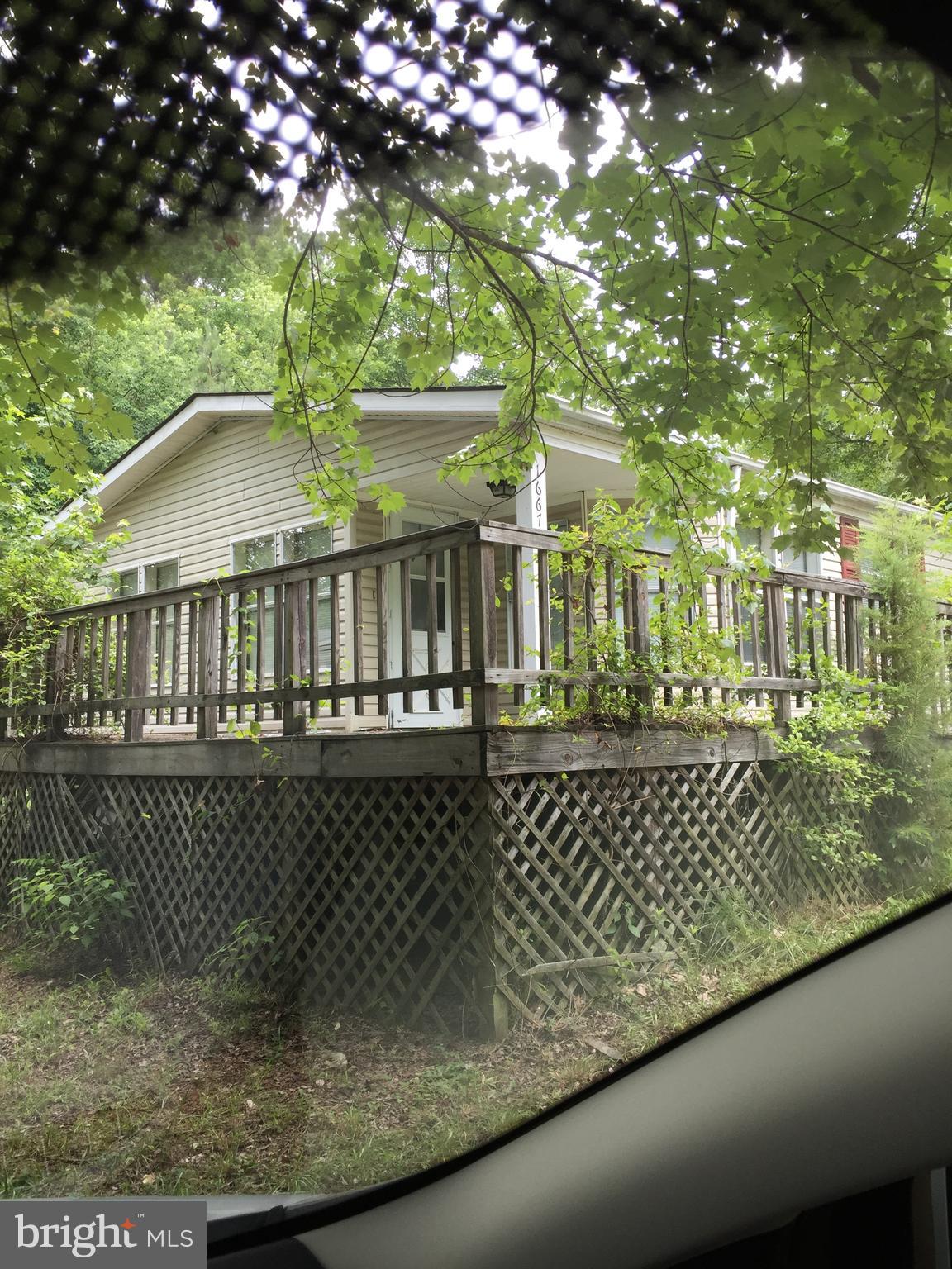 16670 Bennett Court Ridge, MD 20680 - Photo 8 of 15 16674 UNIT - decking needs repair.