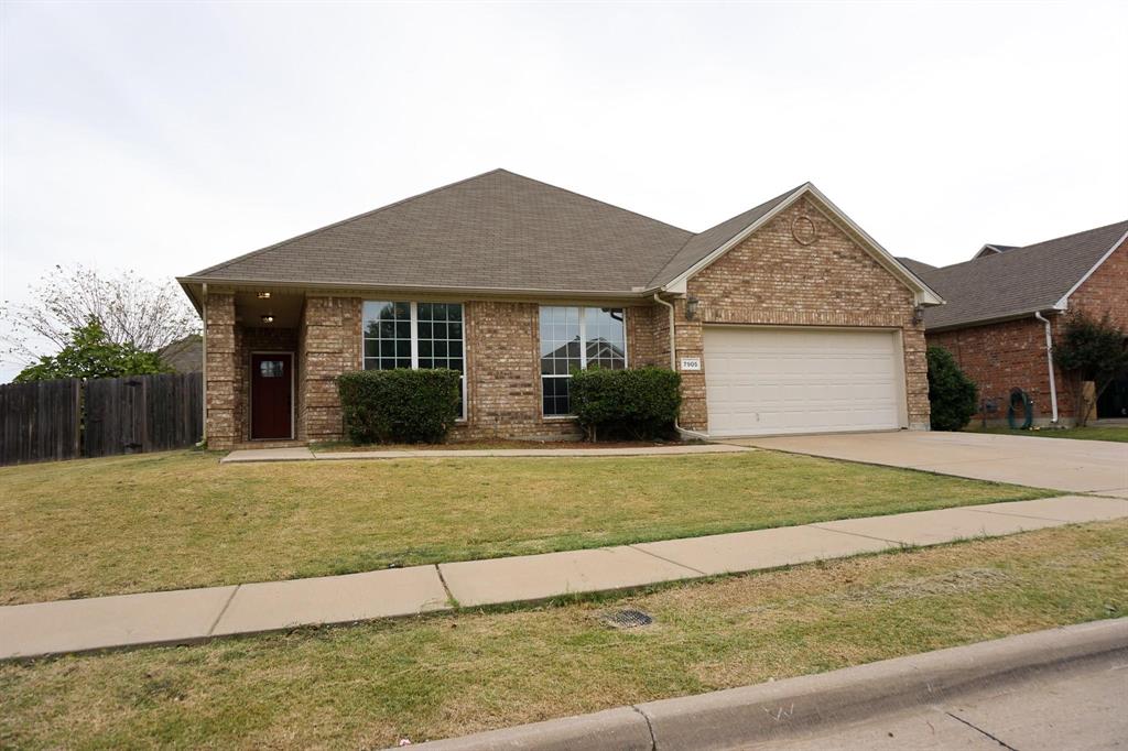 7905 Ranchvale Lane Arlington, TX 76002 - Photo 1 of 1 a front view of a house with a yard and garage